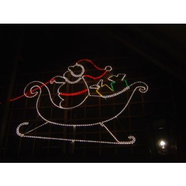 Arrenslee met kerstman en pakjes